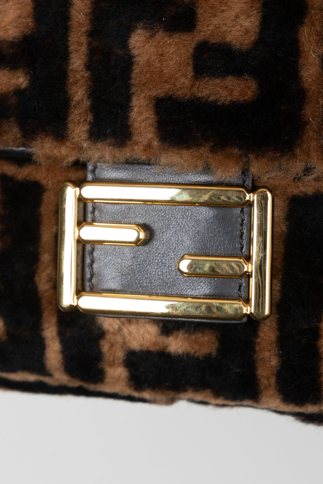 FENDI Zucca Shearling Baguette Bag