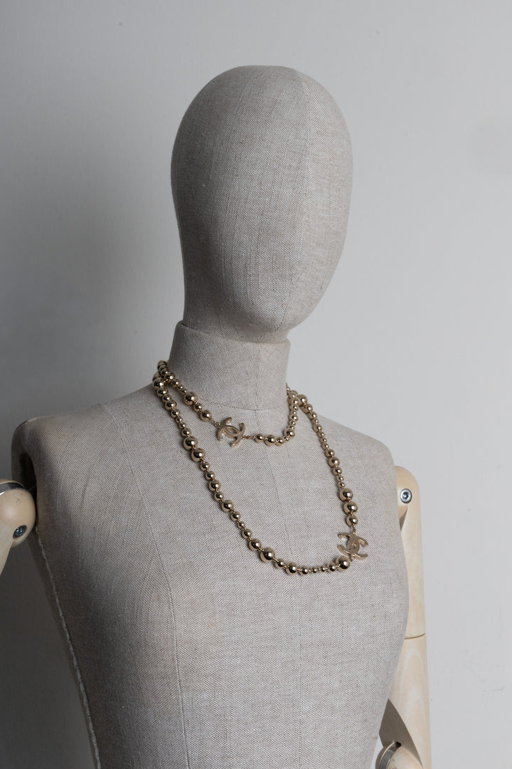 Collier CHANEL CC Perles Or Champagne
