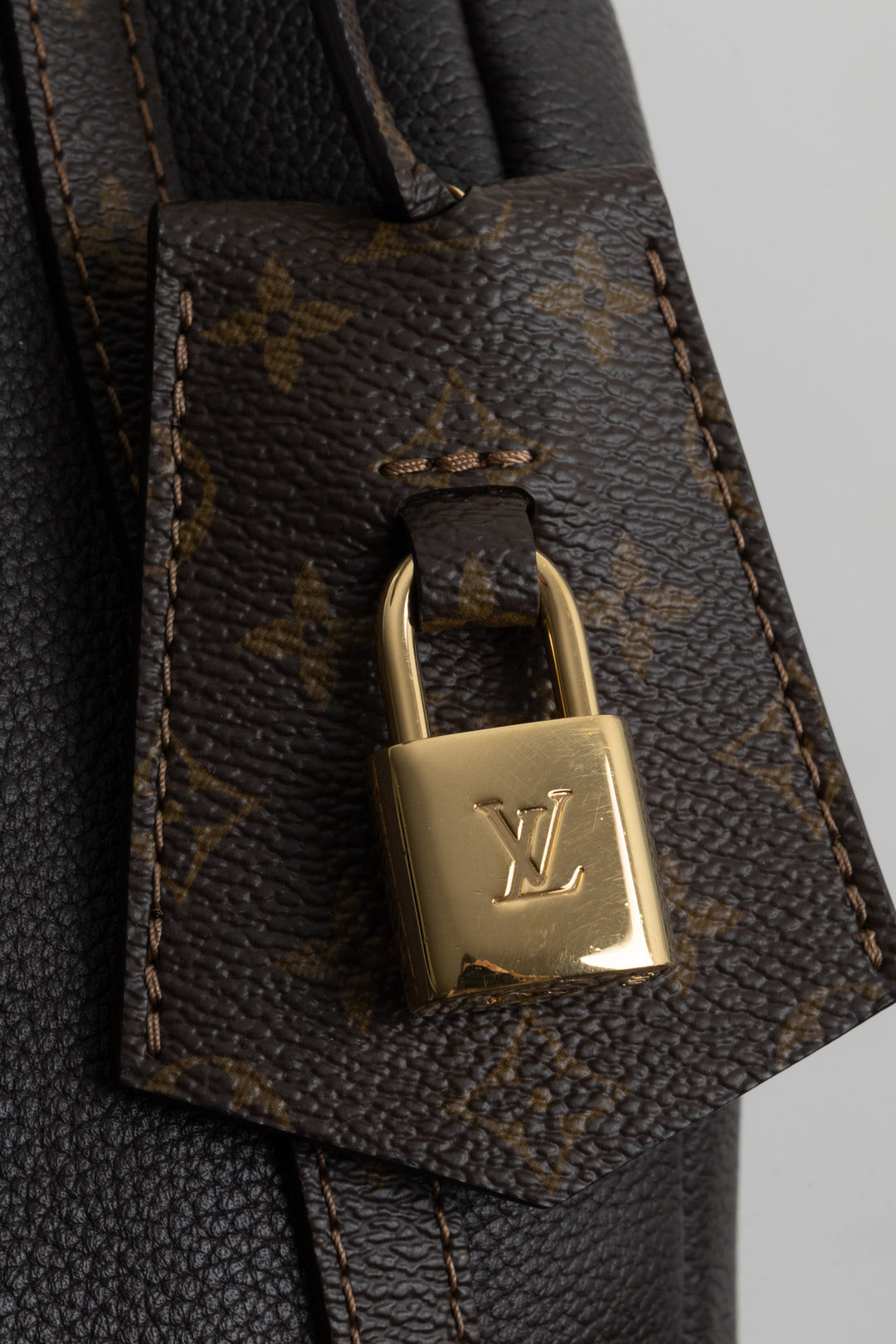 Sac LOUIS VUITTON Express MM en cuir marron
