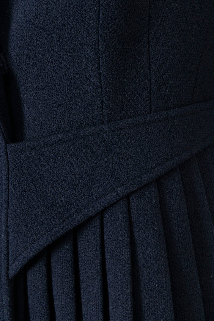 CHRISTIAN DIOR Veste asymétrique plissée ceinturée en laine marine