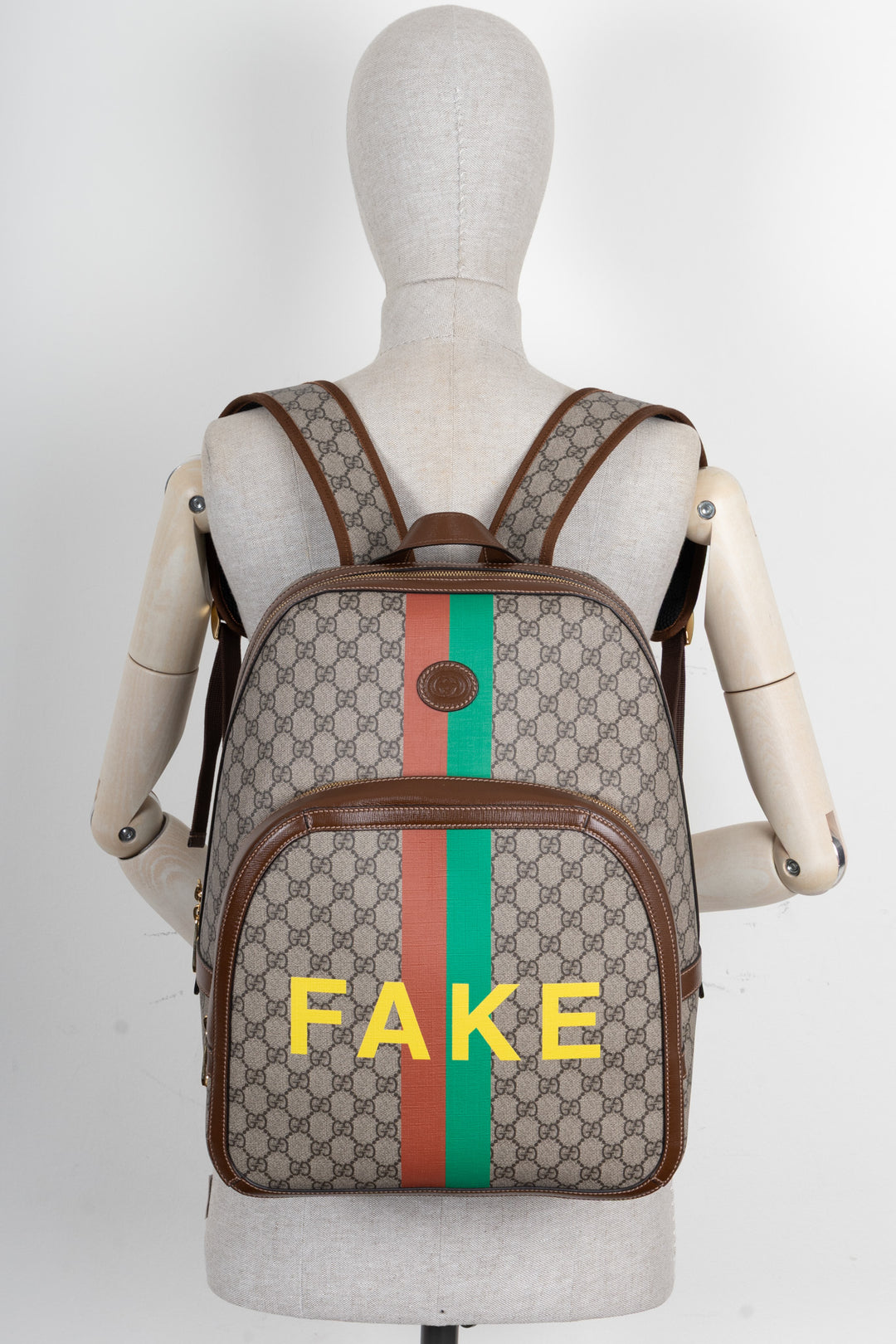 GUCCI GG Fake/Not Backpack Supreme Canvas Brown