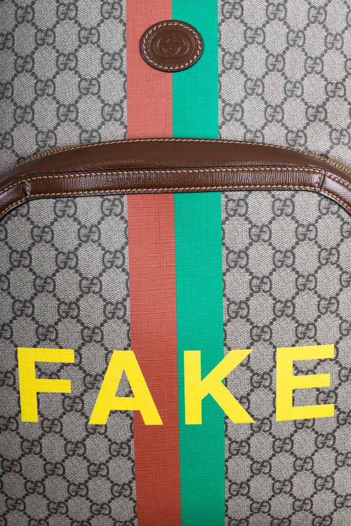 GUCCI GG Fake/Not Backpack Supreme Canvas Brown