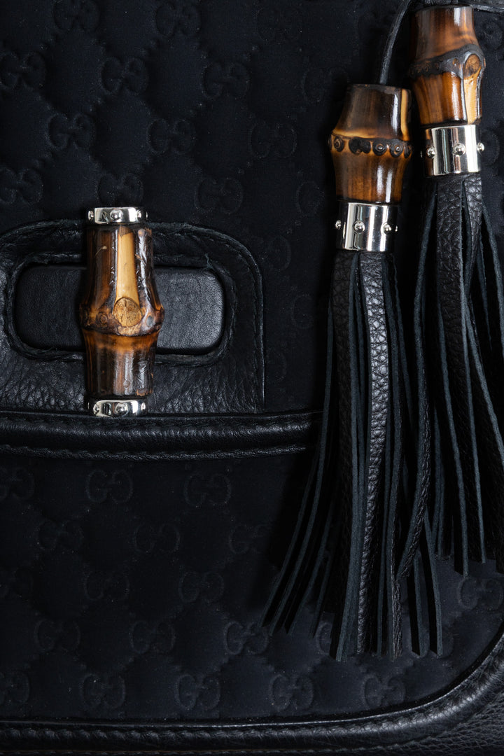 Sac GUCCI 1947 en néoprène avec anse en bambou et motif GG noir