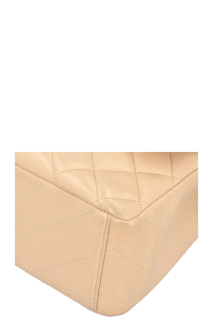 CHANEL Maxi Double Flap Bag Beige