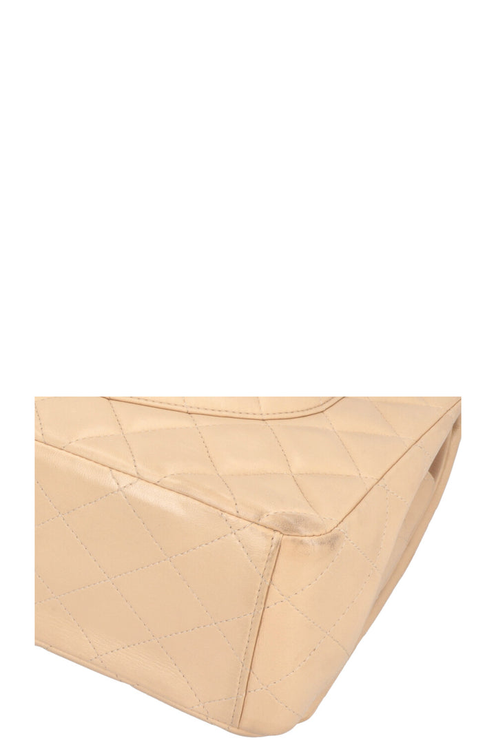 CHANEL Maxi Double Flap Bag Beige