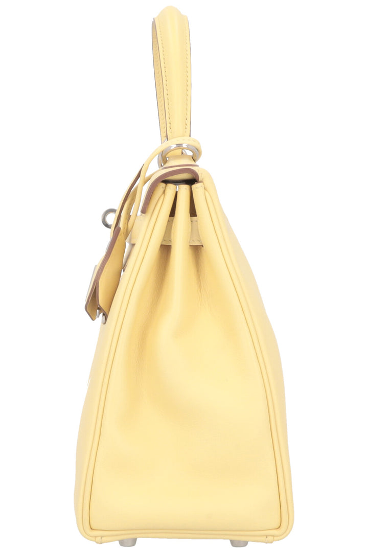 HERMÈS Kelly 25 Swift Jaune Poussin