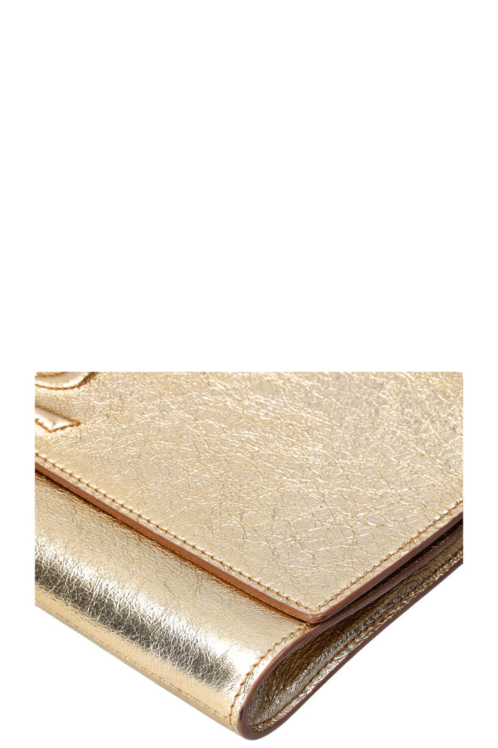 SAINT LAURENT Belle de Jour Clutch Patent Gold