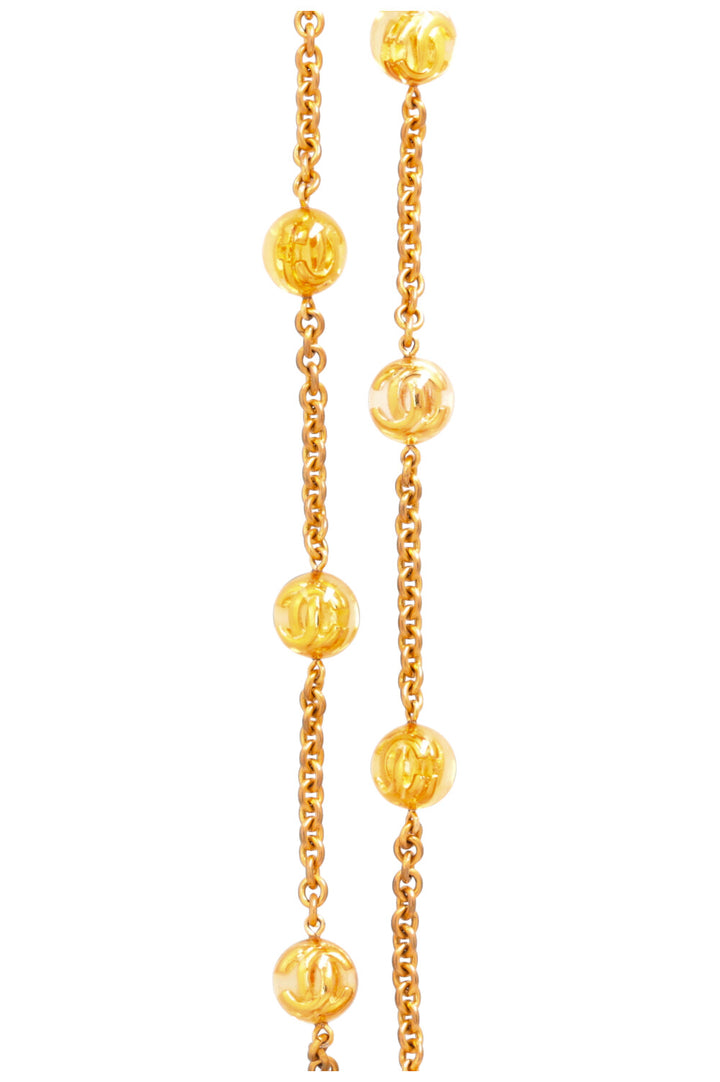CHANEL 1990 Collier CC Boule Lucite Or