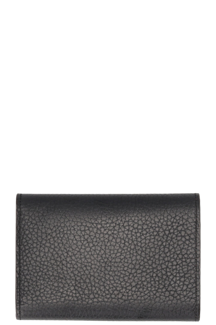 Portefeuille compact Capucines LOUIS VUITTON en cuir noir