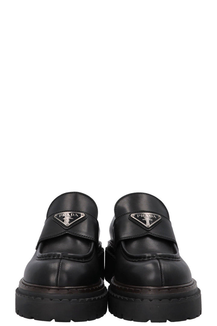 Mocassins PRADA à logo triangulaire noirs