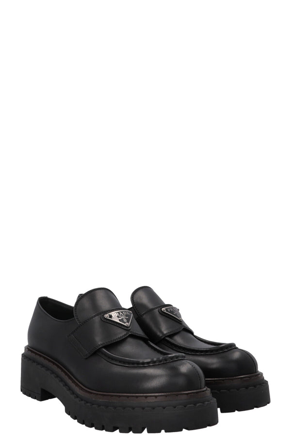 Mocassins PRADA à logo triangulaire noirs