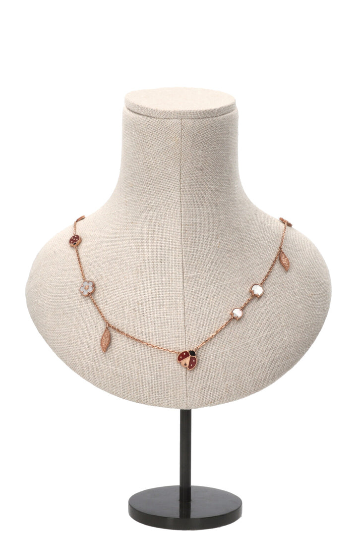 VAN CLEEF & ARPELS Collier long Lucky Spring 15 motifs, or rose 18 carats Or rose