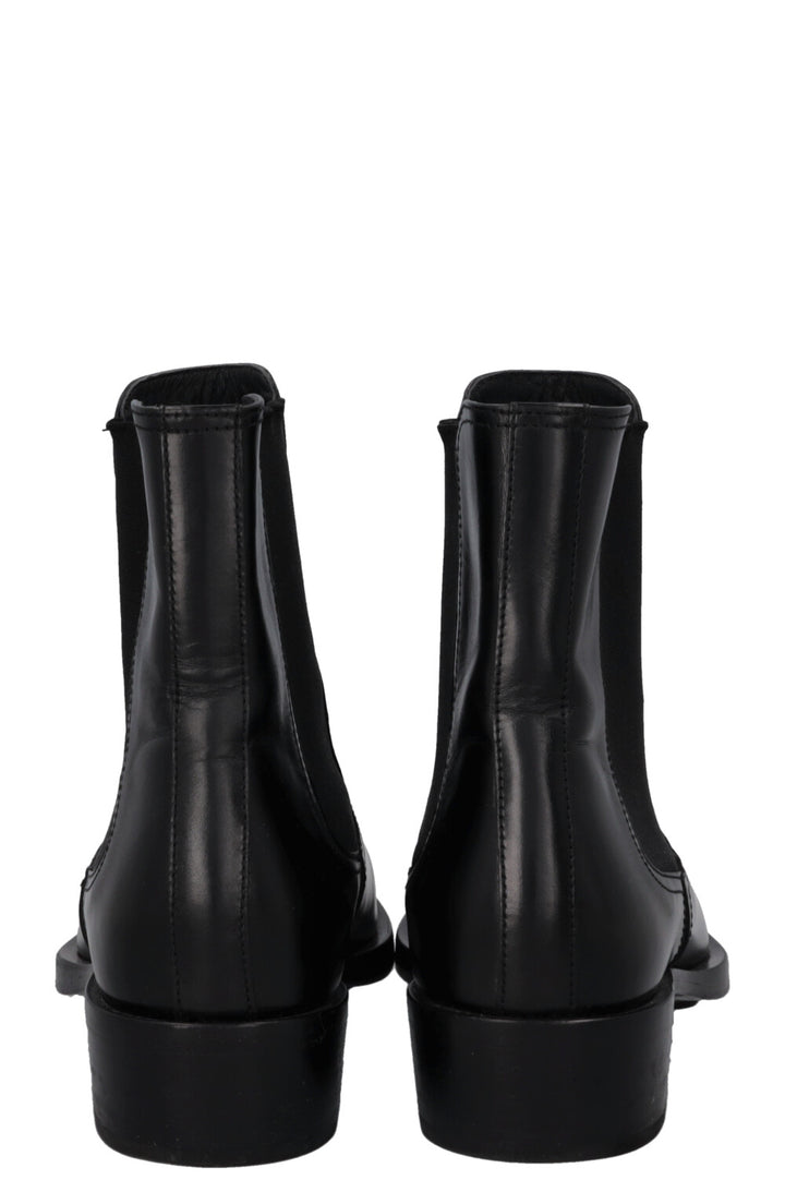 Bottines motardes à bout métallique ALEXANDER MCQUEEN noires