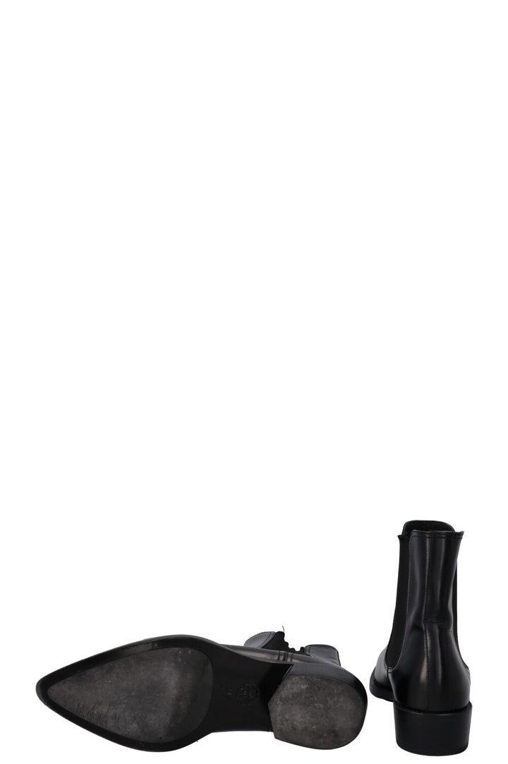 Bottines motardes à bout métallique ALEXANDER MCQUEEN noires