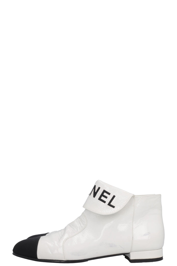 CHANEL Logo Patent Leather Ankle Boots White