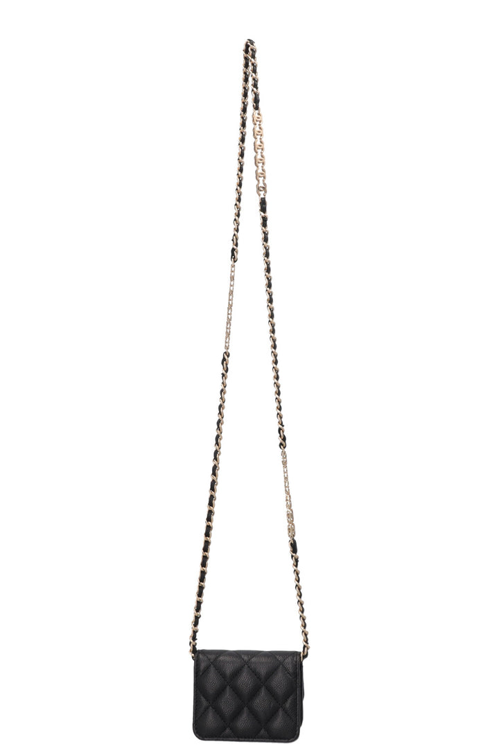 Sac à rabat CHANEL Micro Classic Noir Caviar