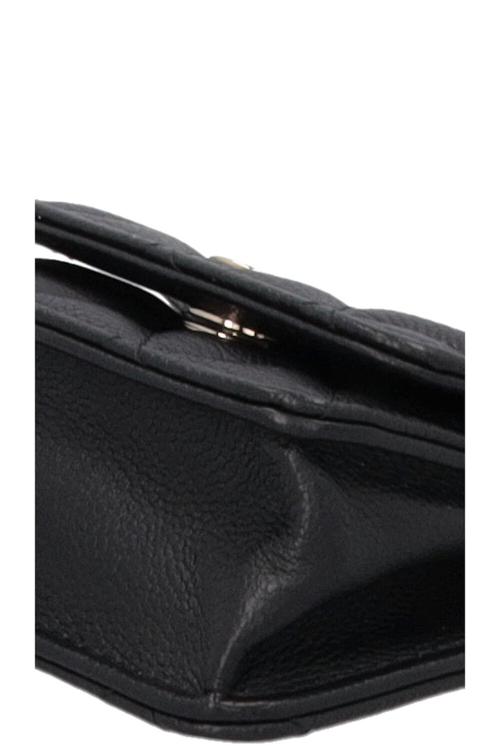 Sac à rabat CHANEL Micro Classic Noir Caviar