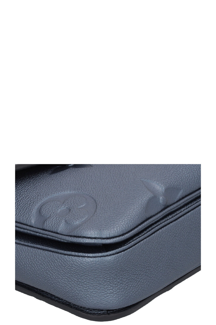 LOUIS VUITTON Pochette Métis Empreinte Blue Metallic