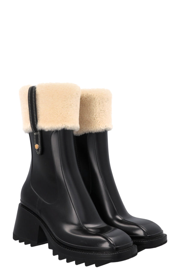 Bottes CHLOÉ Betty en PVC noir bordées de peau lainée