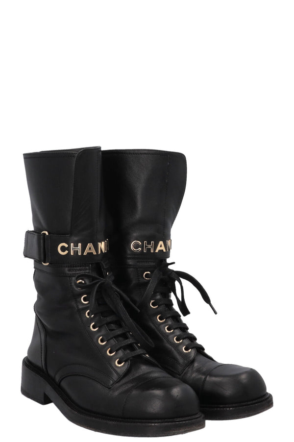 Bottes motardes à lacets et logo CHANEL 2022 en cuir noir