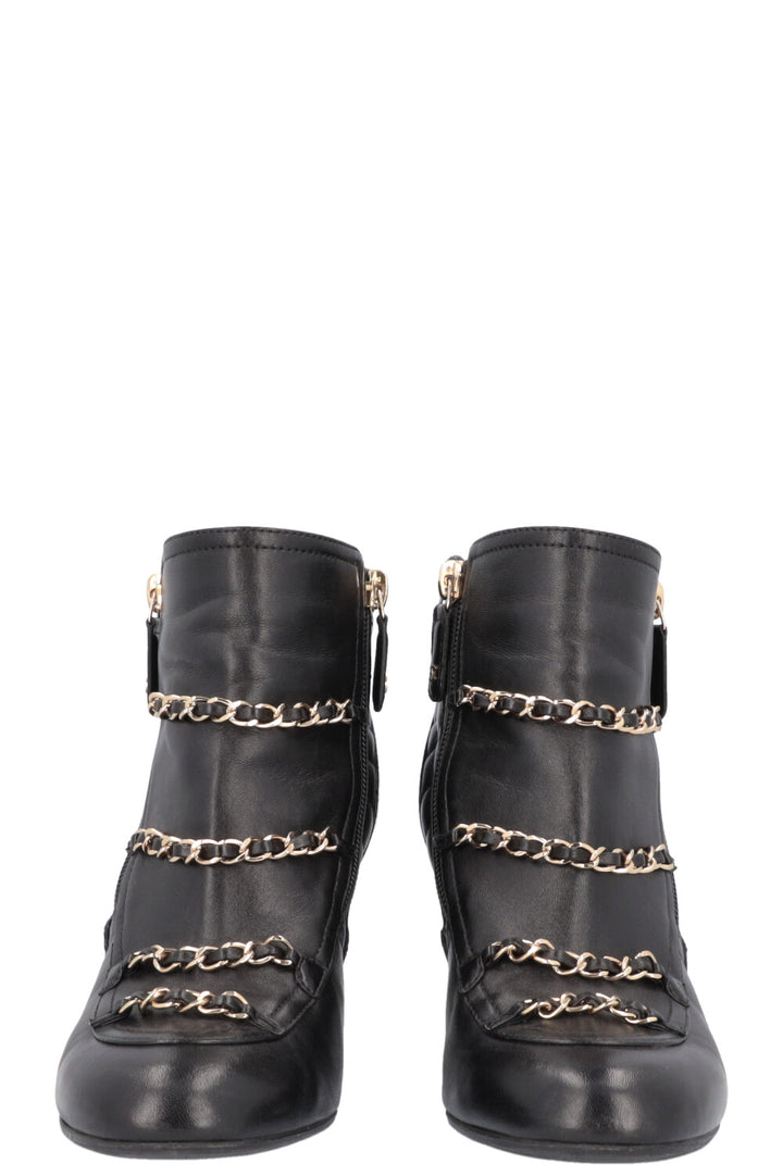 CHANEL boots with chain