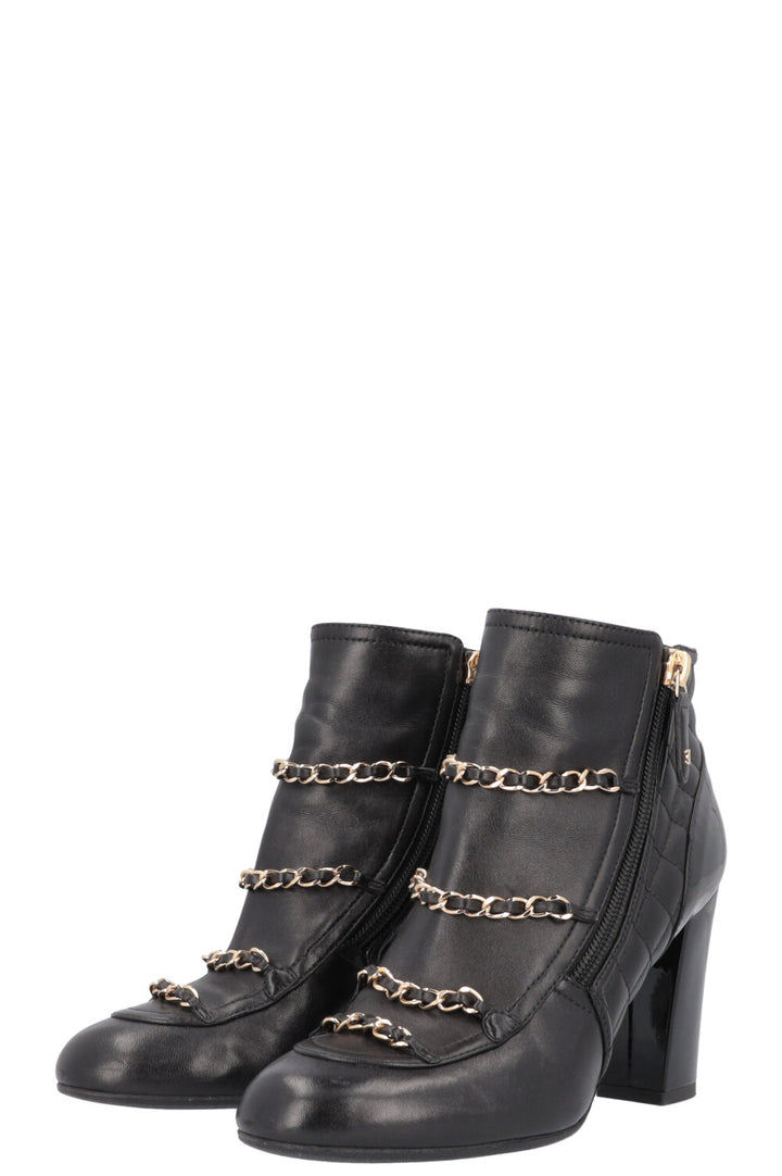 CHANEL boots with chain