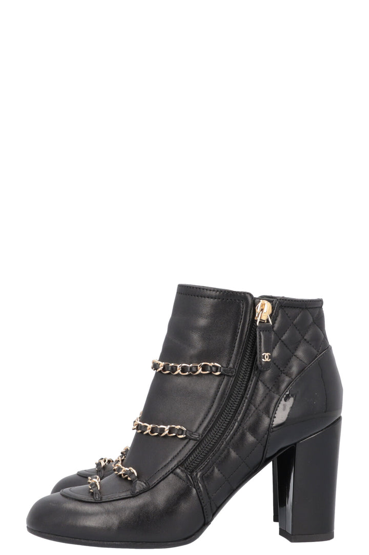 CHANEL boots with chain