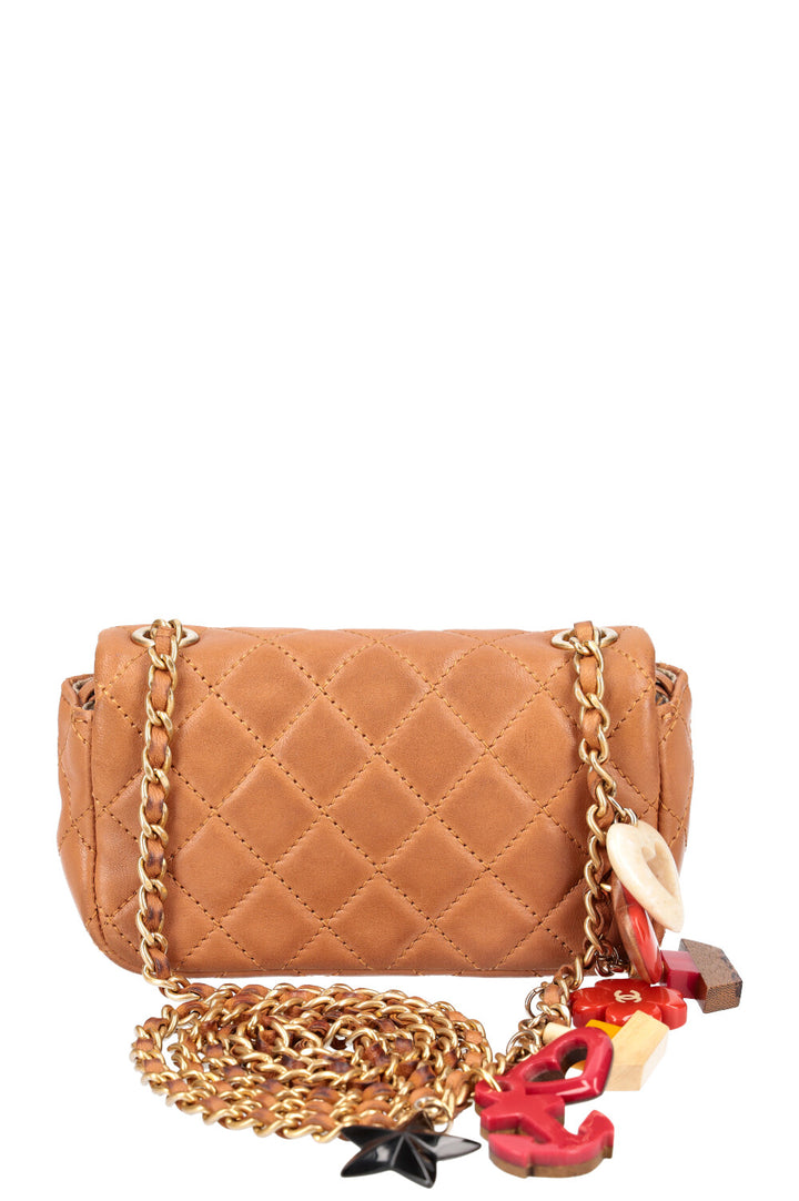 CHANEL Cruise Charm Micro Single Flap Bag