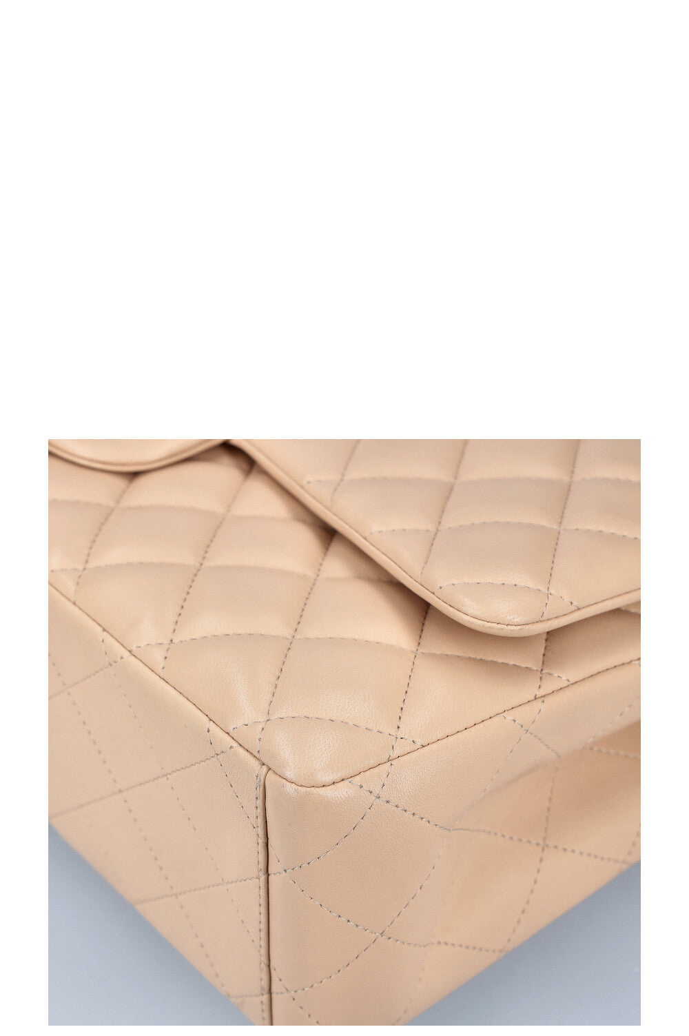 CHANEL Maxi Double Flap Bag Beige