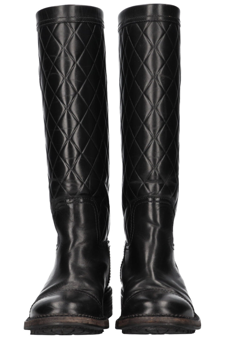 CHANEL quilted boots