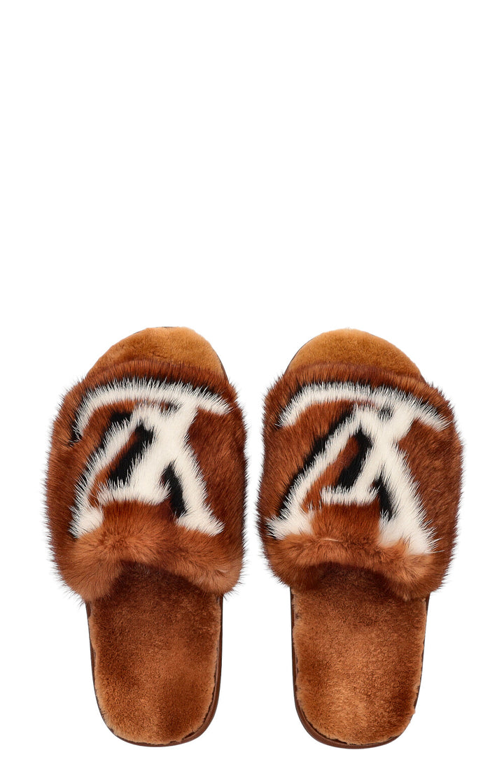 LOUIS VUITTON Mules plates Homey Fourrure
