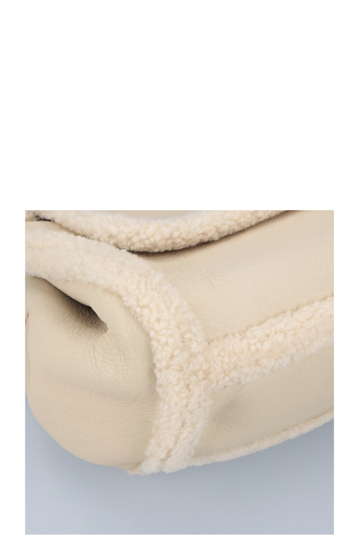SAINT LAURENT Sac Nolita Shearling Ivoire